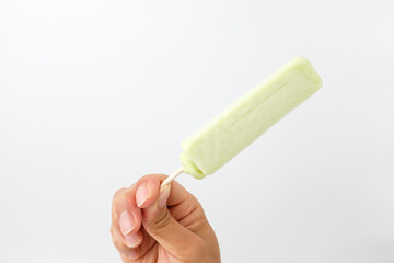 Melon ice cream on white background