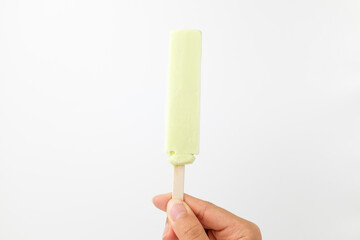 Melon ice cream on white background
