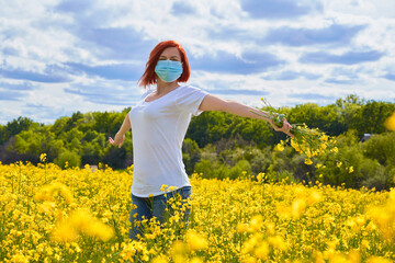 A women without allergies breathes the smells of flowers freely