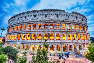 Fototapeta na wymiar Illuminated Colosseum at Dusk, Rome