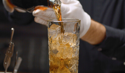 Making a Long Island Ice Tea Cocktail