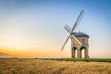 Naklejka na ściany i meble Summer Sunset with Windmill