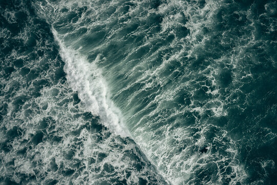 wave breaking over reef from above