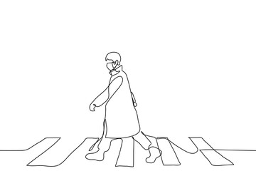 The full-length figure of a man dressed in a cloak and walking along a pedestrian crossing. A man alone walks at a wide pace, waving his arms wide. Can be used for animation.