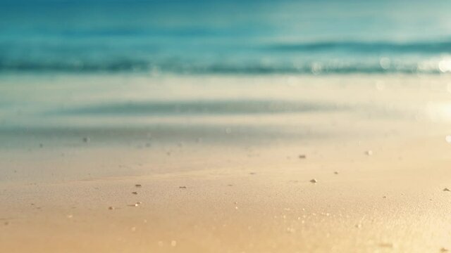 Sea beach background in Thailand by blurring the waves ( bokeh ) and focus on the beach front during the daytime of the summer holiday for tourism , travel , vacation and relaxation spa concept