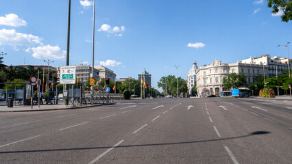MADRID, SPAIN ,JUNE 05, 2020 : THE CASTELLANA STREET IN MADRID WITH THE TOWERS OF COLON IN THE BACKGROUND