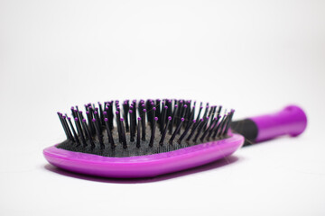 brush for hair on a white background