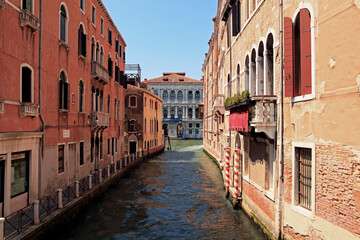 Fototapeta na wymiar A small canal in Venice, Italy.