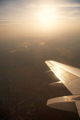 Naklejka na ściany i meble view from an airplane window down to the ground.