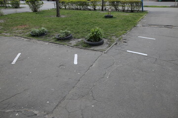 Marks for people in line. Keeping a distance. Marks in front of the grocery store. Distance marking
