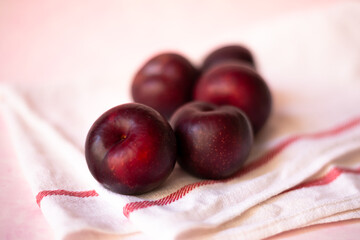plums in light background