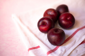 plums in light background