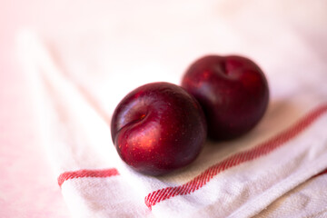 plums in light background