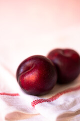 plums in light background