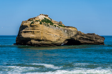Fototapeta na wymiar Big rock in the Atlantic ocean. Sea view background. High quality photo