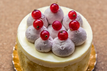 Cake closeup on wood background. Top view. Healthy fresh nutrition. Birthday and celebration. Organic fruit. Healthy food.