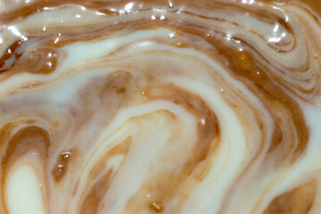 abstract milk chocolate cream on a white background