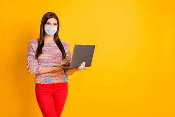 Portrait of her she nice brown-haired girl using laptop wearing gauze mask copy space mers cov...