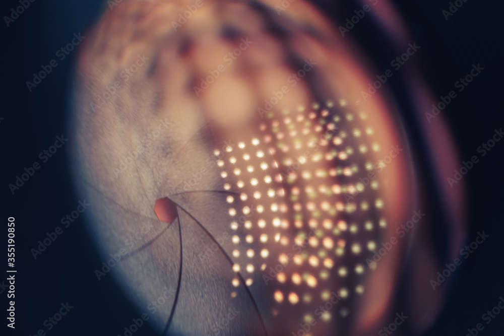 Poster beautiful camera lens on a dark with yellow shine reflection light background. macro view.