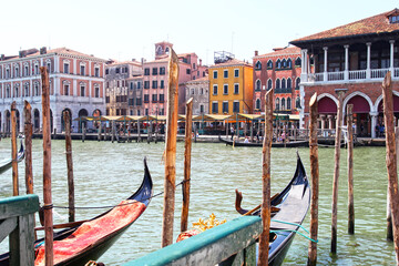 Fototapeta na wymiar Gondolas along the Grand Canal in Venice, Italy