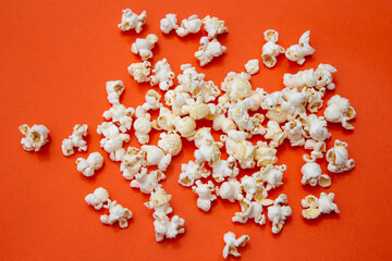 popcorn on orange color background