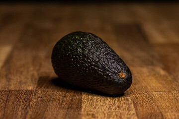 avocado on top of wooden table
