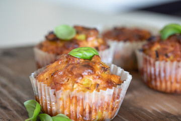 Fresh baked savory muffin. With herb spread and sprinkled with basil. healthy muffin. fresh baked food