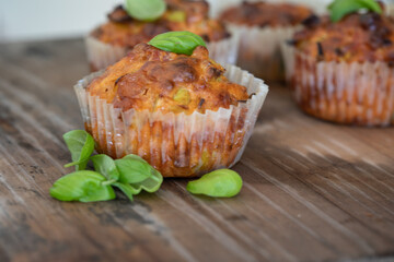 Fresh baked savory muffin. With herb spread and sprinkled with basil. healthy muffin. fresh baked food