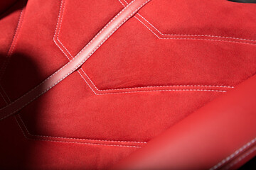 Extreme close up of red luxury car seat