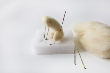 A kind of modern hobby, felt. A mini Siberian doll  is made.
Accessories for needle felt, wool weaving handmade craft by sheep hair. Doll was made by sheep hair wool