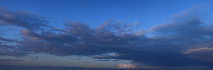  Photo of cumulus clouds.
Panoramic, horizontal image of the atmospheric phenomenon, spring season. - 355197232