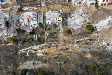 Landslide caused by rains of hurricane destroyed expensive cottages and houses. Destroyed house,...