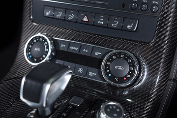 AC control panel in luxury car interior