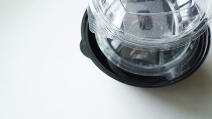 Black and white Plastic food containers on white background