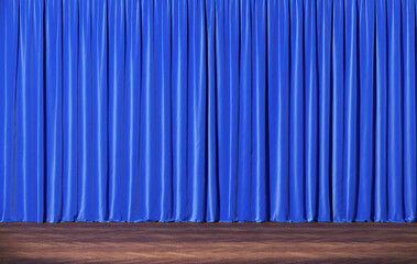 Empty theater stage with blue curtains. 
