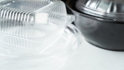 Black and white Plastic food containers on white background
