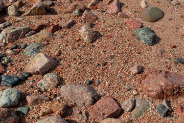 Red Sand and Stones of the red Sea Coast, Natural Texture Background