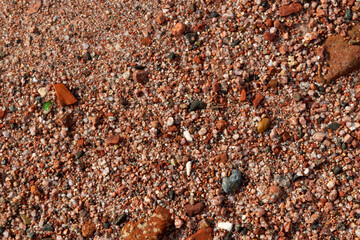 Red Sand and Stones of the red Sea Coast, Natural Texture Background