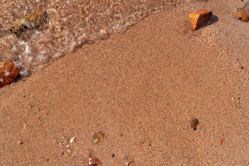 Red Sand and Stones of the red Sea Coast, Natural Texture Background