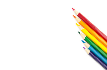 Fototapeta premium LGBT pride rainbow flag made of six colored pencils on white