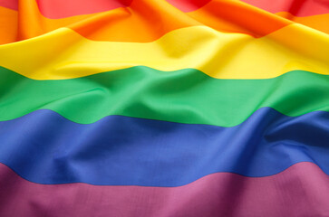 A rainbow flag background with copy space
