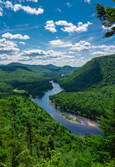 Fototapeta na wymiar Awesome summer view from a verdant hill in Jacques Cartier National Park, Quebec province, Canada