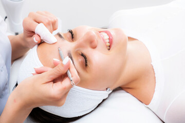 Photo facial cleansing cosmetology. Aesthetic cosmetology. Mechanical face peel. Skin acne treatment.