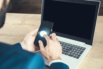 man hand phone in office desk