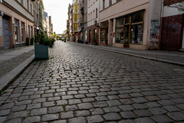 Empty street with closed stores in Berlin Germany due to corona virus outbreak in April 2020