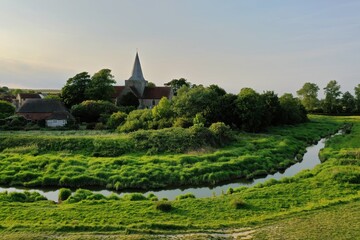 beautiful British landscape of a fairytale countryside church