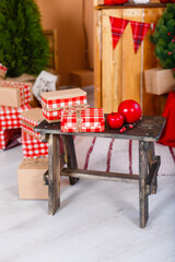 Christmas decorated room. Vintage New Year decorations. Gift boxes under fir-tree. Christmas mood. Celebrating of New Year