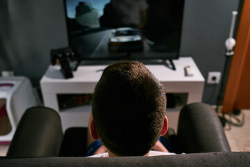 Child playing with the console at home
