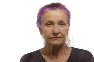 semior woman in her sixties with a skeptical look on her face - 355220636