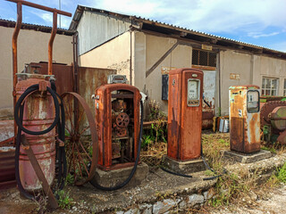 Vintage old abandoned petrol pump station in greece